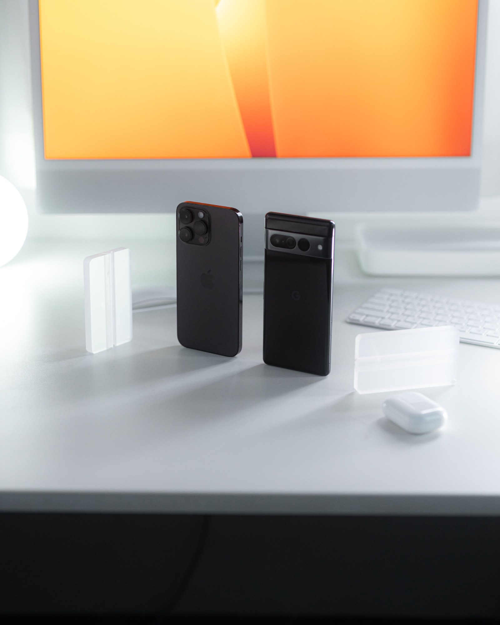 Concept visual: two smartphones on a studio desk